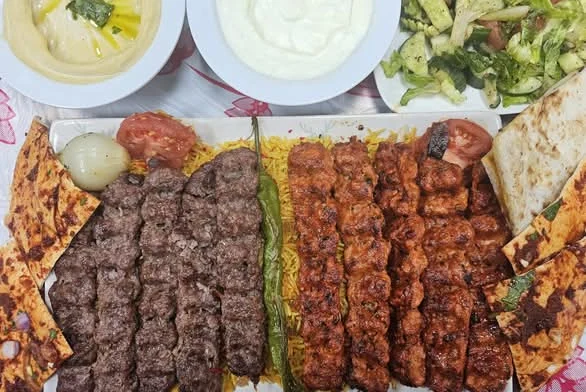 Charcoal-grilled kebab and shawarma plate at Donya Kebab, the Middle Eastern restaurant serving Ealing in London Ontario