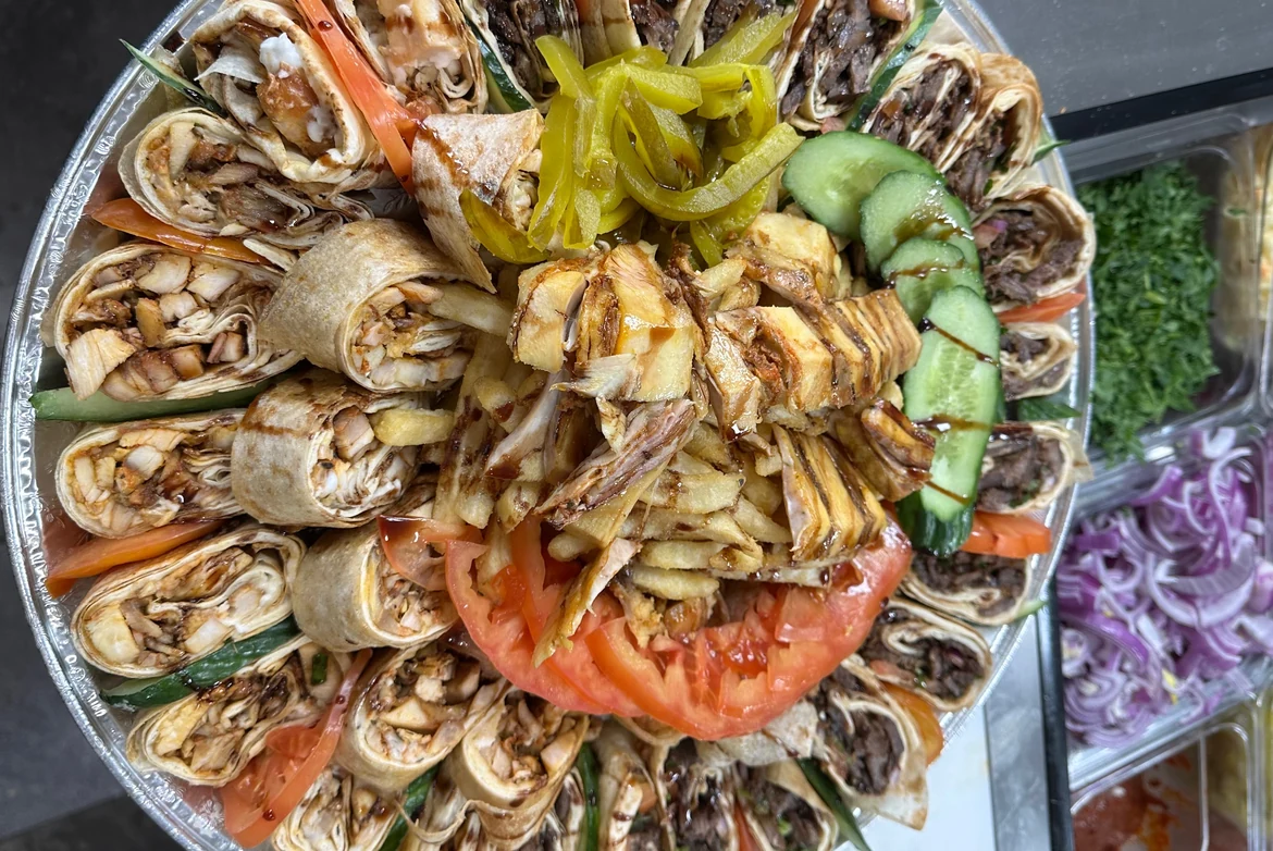 Charcoal-grilled kebab and shawarma platter at Donya Kebab Middle Eastern restaurant in London, Ontario