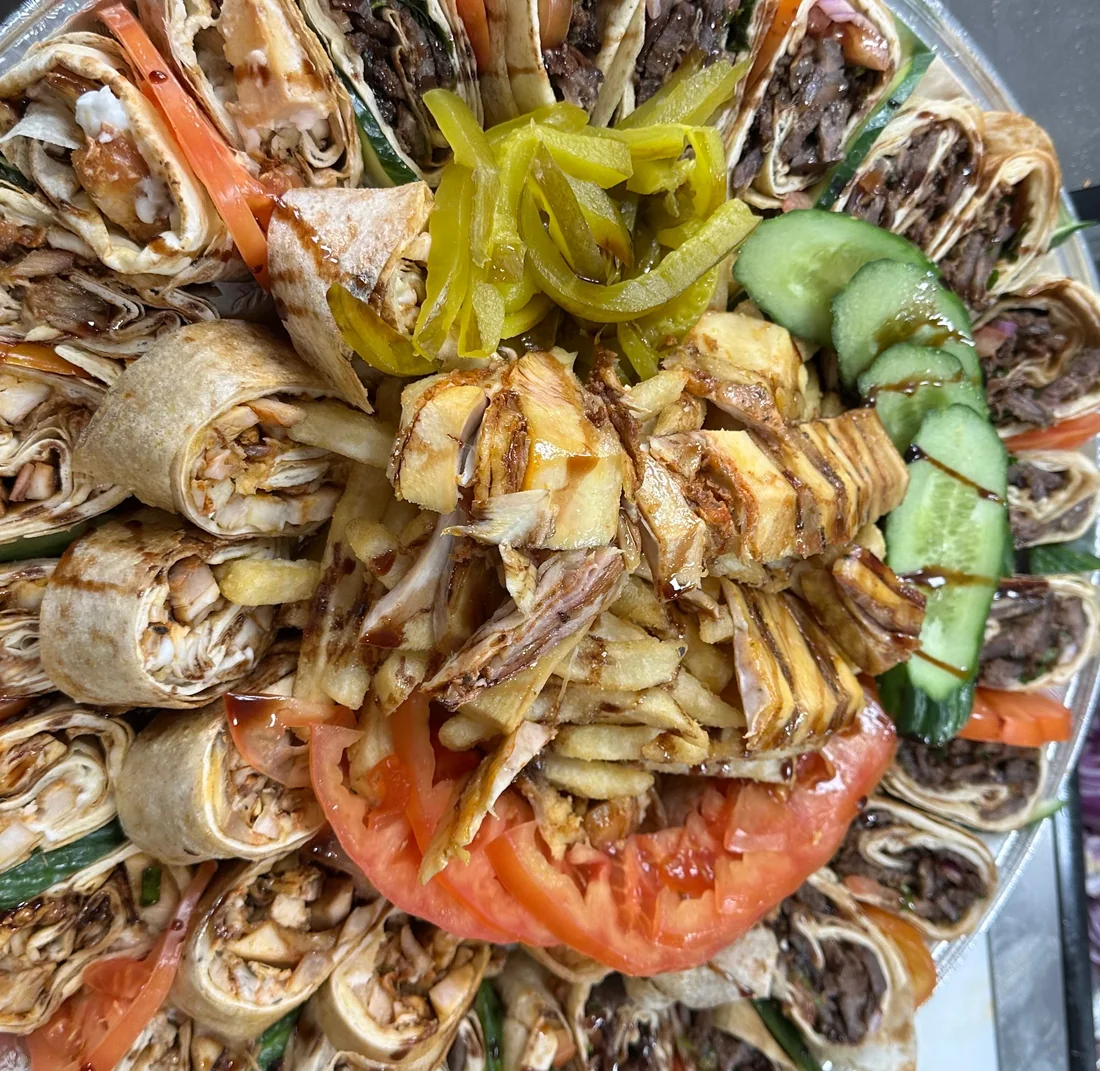 Beef shawarma family deal tray with wraps and garlic sauce at Donya Kebab in London, Ontario