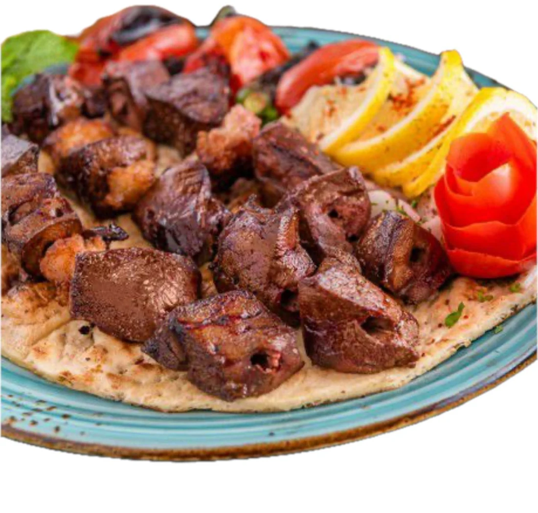 Charcoal-grilled beef tenderloin skewers with flatbread at Donya Kebab in London, Ontario