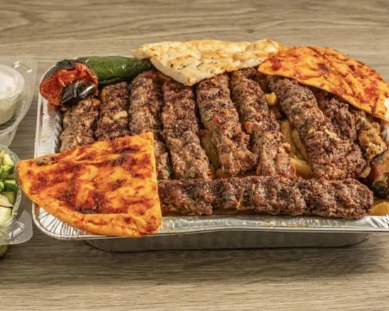Iraqi style beef kebab skewers grilled over charcoal at Donya Kebab, a halal Middle Eastern restaurant in London, Ontario